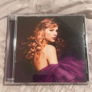Taylor Swift CD with Purple and Black Cover